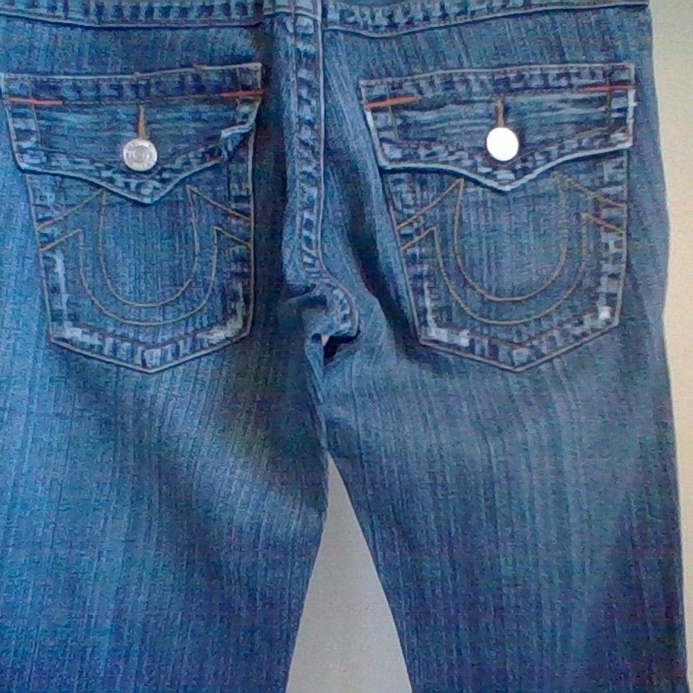 True Religion distressed flare jeans size 28